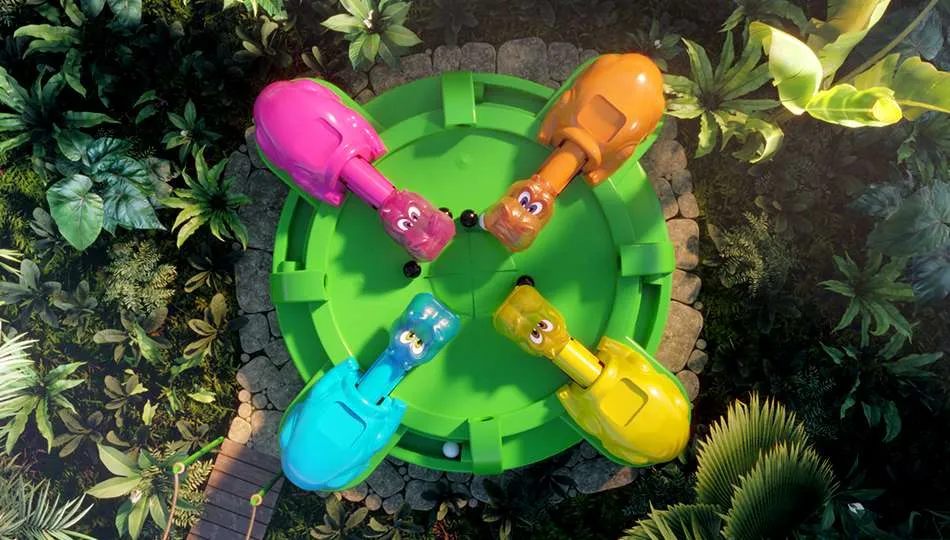 Hungry Hungry Hippos Bonusspiel in Evolution Game Night Live, mit vier bunten Nilpferden, die Bälle sammeln.